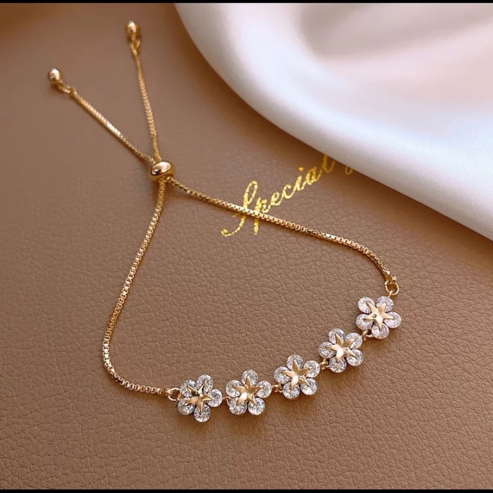 Dainty gold flower crystal cubic zirconia bracelet